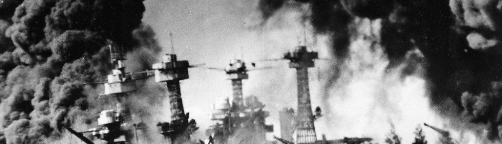The US Ships on Battleship Row burning in the wake of the Japanese attack on the morning of December 7th, 1941.